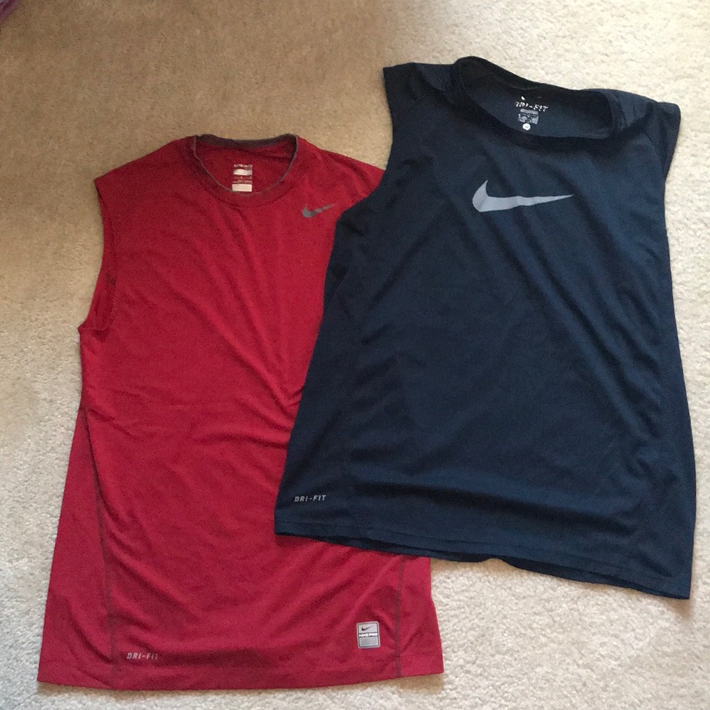 2 Nike dri-fit sleeveless shirts.